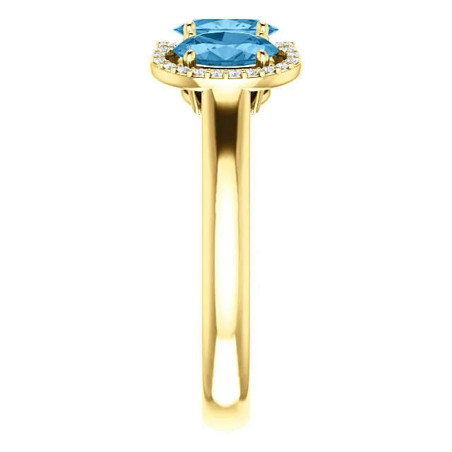 14KT GOLD 1.74 CTW BLUE TOPAZ & .10 CTW DIAMOND 3 STONE OVAL HALO RING