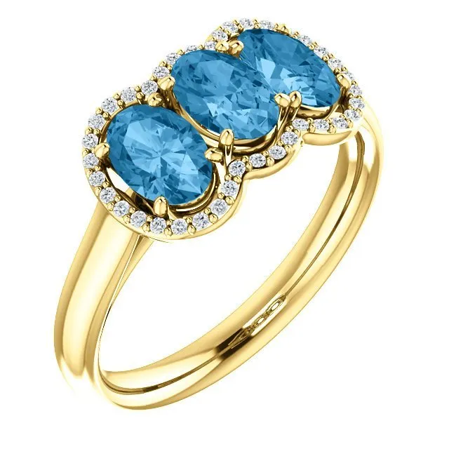 14KT GOLD 1.74 CTW BLUE TOPAZ & .10 CTW DIAMOND 3 STONE OVAL HALO RING