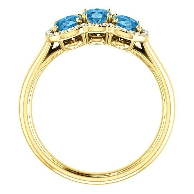 14KT GOLD 1.74 CTW BLUE TOPAZ & .10 CTW DIAMOND 3 STONE OVAL HALO RING