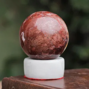 Artisan Crafted Garnet Sphere Sculpture with Calcite Stand - Passion | NOVICA