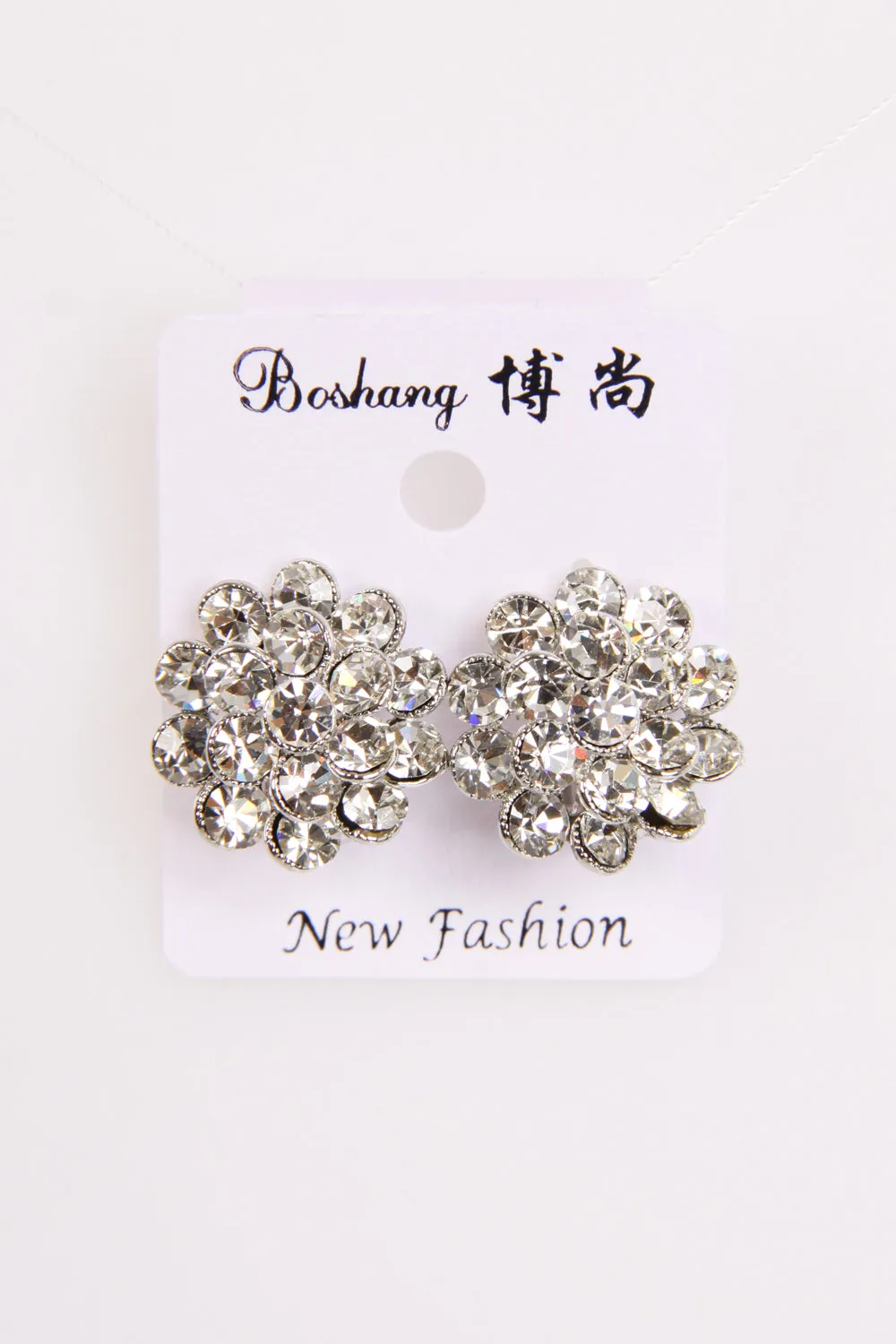 Raised middle round diamante clear Clip on Earrings