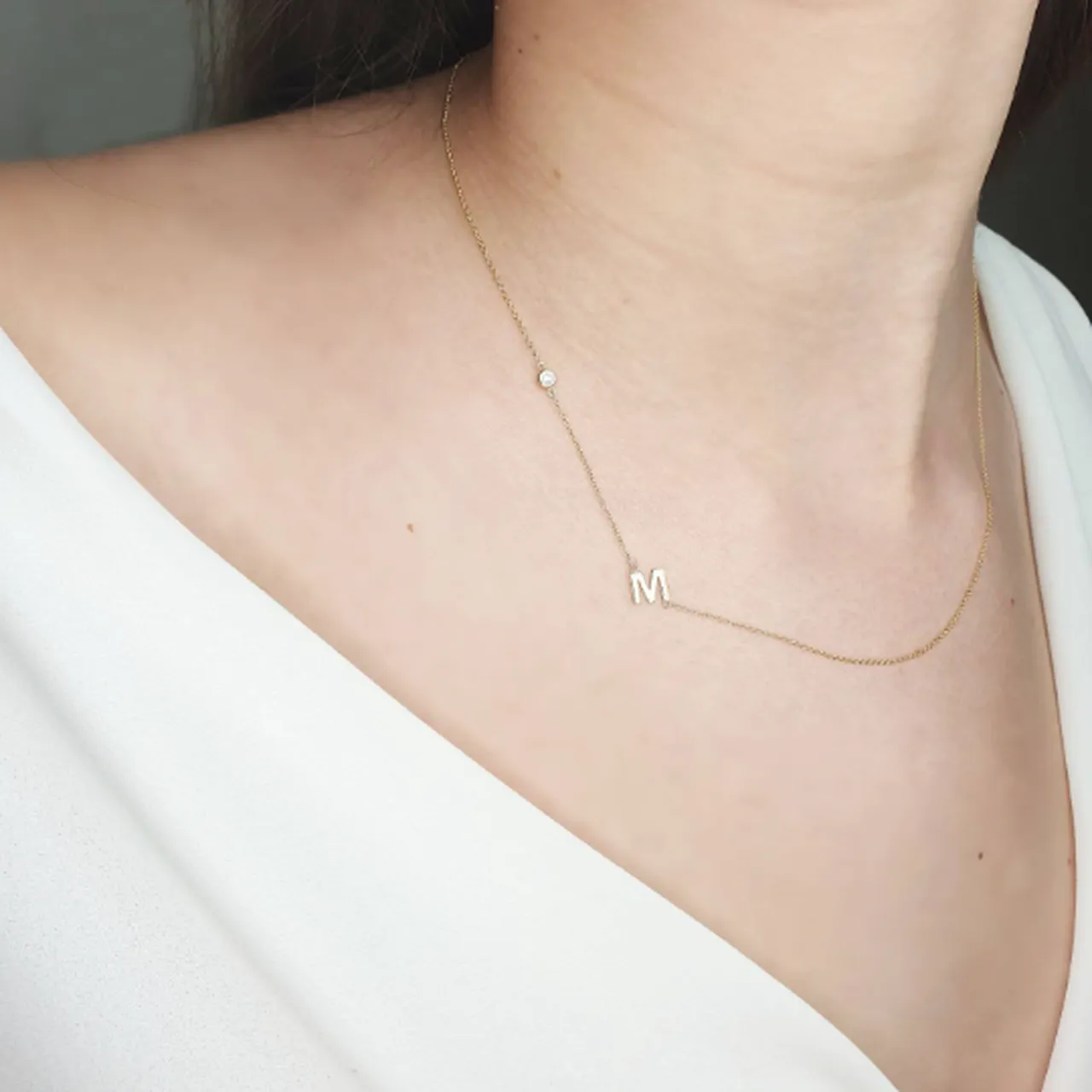 Sideways initial necklace