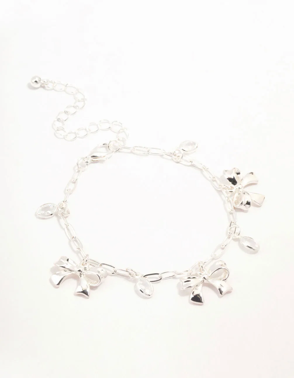 Silver Plated Alternating Cubic Zirconia & Bow Charm Bracelet